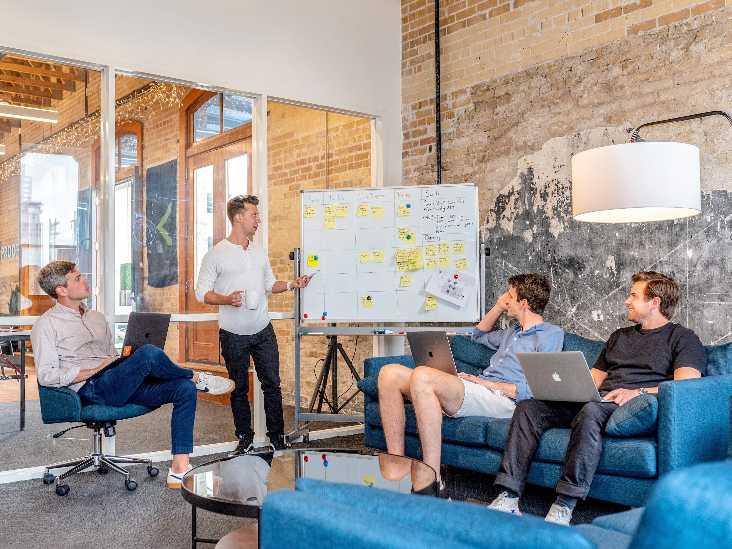 A whiteboard with workflow diagrams